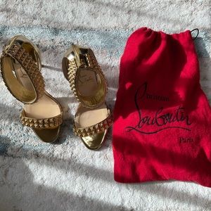 CHRISTIAN LOUBOUTIN GOLD HEELS